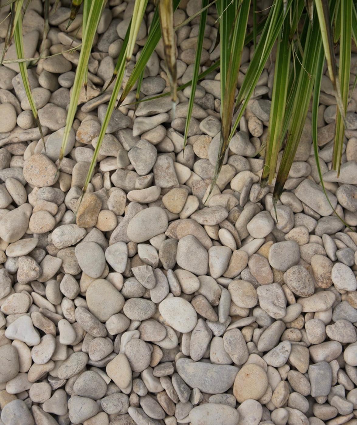 Tuinmaterialen zoals grind, split en kantopsluitingen